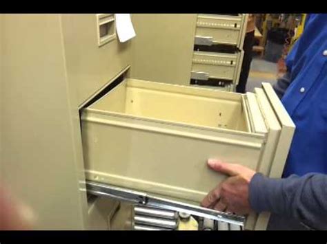 disassemble steel file cabinet 4 drawer|how to remove drawer from file cabinet.